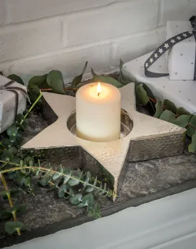 Hammered metal star candle holder